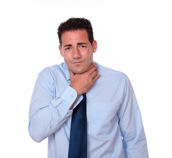Schöner junger Mann mit Halsschmerzen — Stockfoto