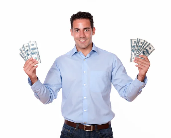 Spansktalande kille står och håller dollar — Stockfoto