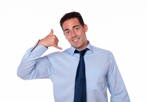 Cute latin guy with call gesture — Stock Photo, Image