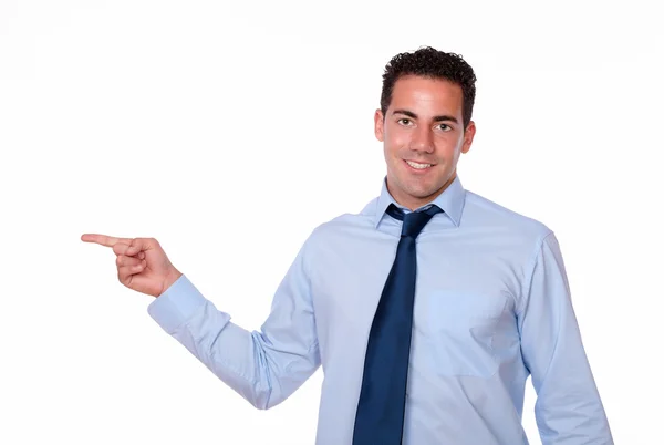 Fashionable guy pointing to his right — Stock Photo, Image