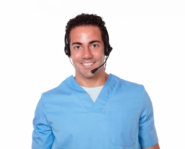 Handsome male nurse with earphone smiling — Stock Photo, Image