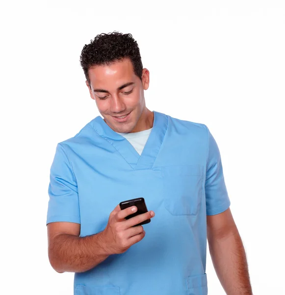 Charismatic nurse man sending a message — Stock Photo, Image