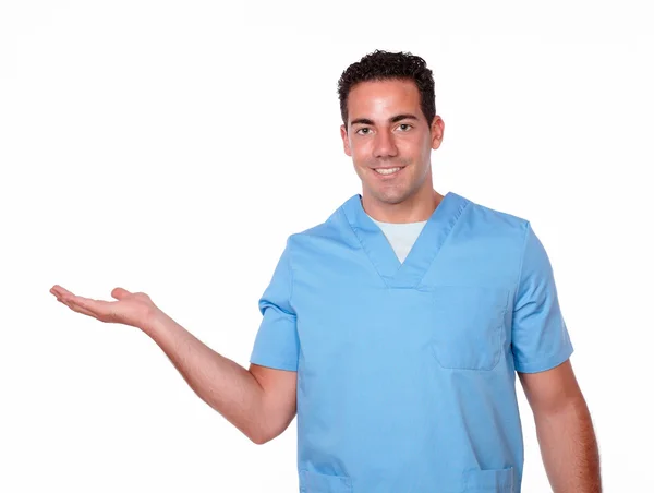 Nurse man holding out his right palm — Stock Photo, Image