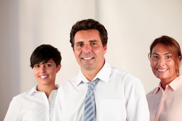 Boss team smiling and looking at you — Stock Photo, Image