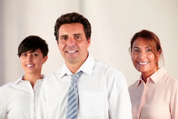 Handsome hispanic businessman smiling at you Stock Image