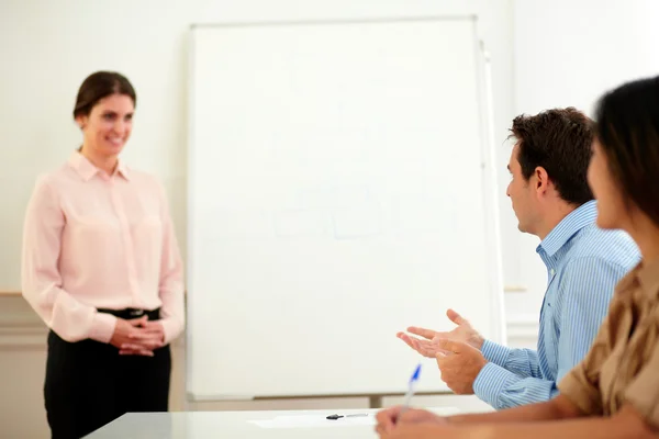 Beautiful adult businesswoman smiling and looking — Stock Photo, Image