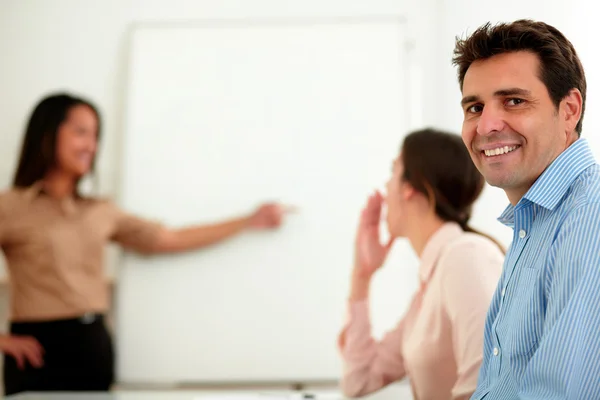 Adult businessman smiling and looking at you — Stock Photo, Image