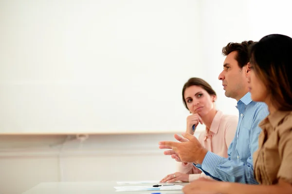 Hispanic businessman speaking during a conference — Stock Photo, Image