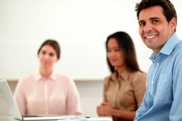 Charming businessman looking and smiling at you — Stock Photo, Image