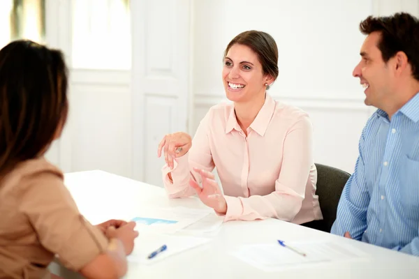 Adult professional colleagues working and smiling — Stock Photo, Image