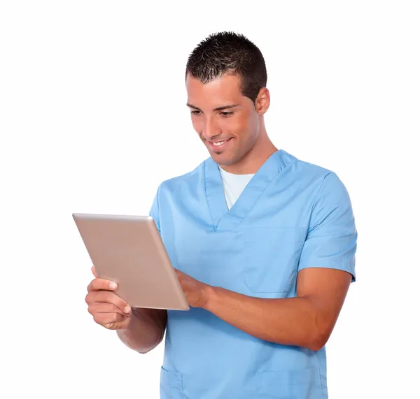 Schöner Krankenschwester Kerl mit seinem Tablet-PC — Stockfoto