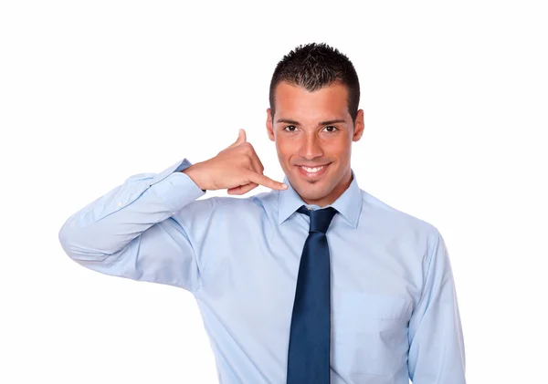 Attractive latin guy with call gesture — Stock Photo, Image