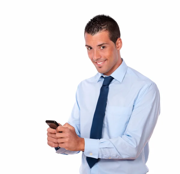 Attractive young male sending a message — Stock Photo, Image