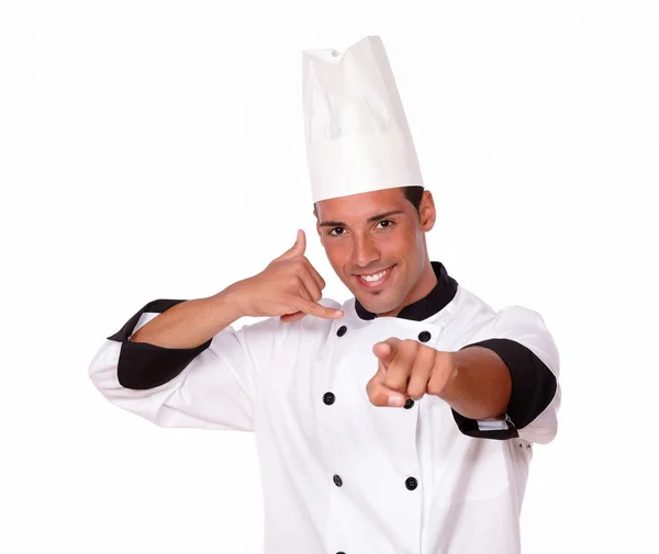 打电话的手势指向年轻厨师 — 图库照片