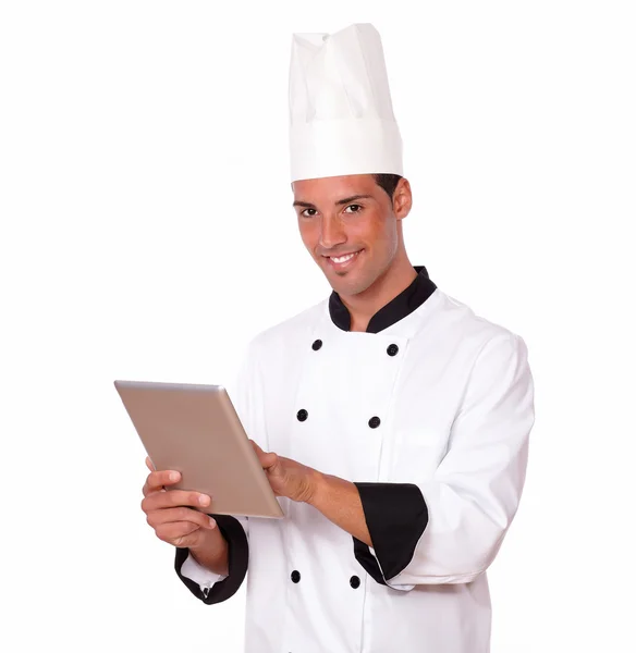 Professional chef man using his tablet pc — Stock Photo, Image