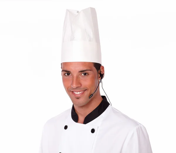 Young latin chef talking on microphone — Stock Photo, Image
