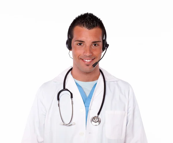 Professional medical doctor talking on headphones — Stock Photo, Image