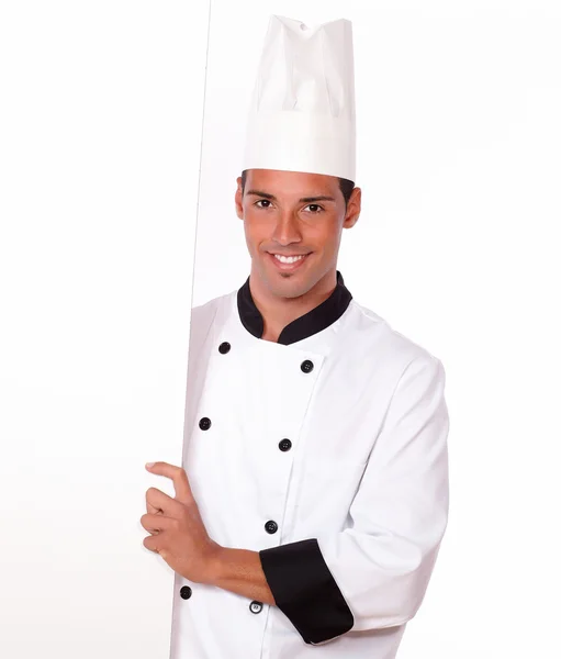 Chef profesional sosteniendo un cartel en blanco — Foto de Stock