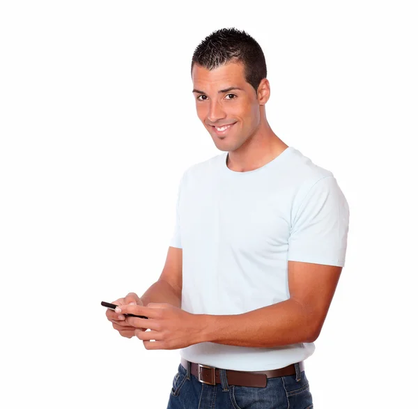 Homem elegante enviando uma mensagem por celular — Fotografia de Stock
