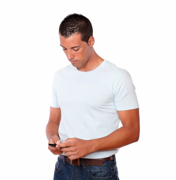 Handsome male looking at his cellphone — Stock Photo, Image