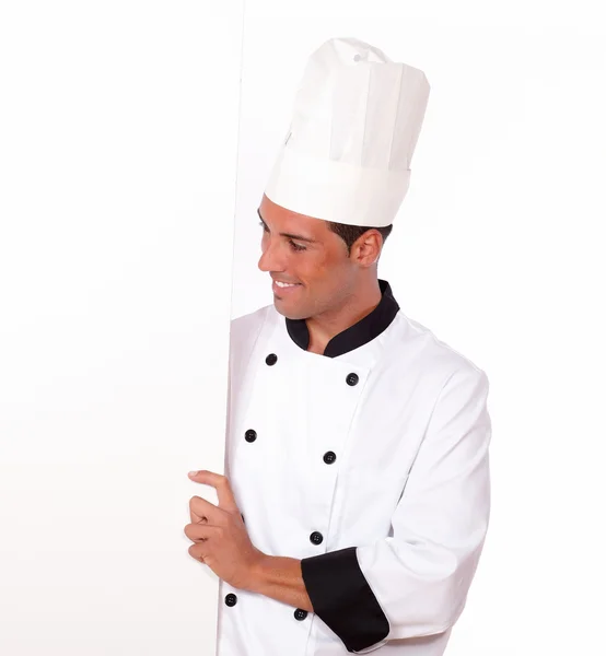 Professional chef holding a white blank placard — Stock Photo, Image