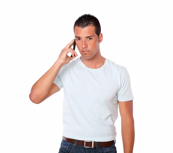 Gorgeous young man speaking on his cellphone — Stock Photo, Image