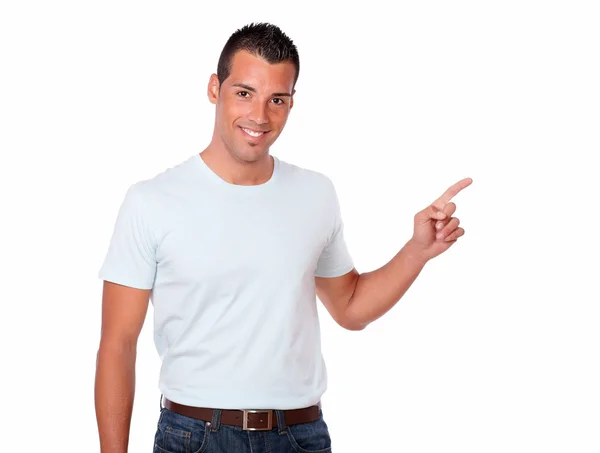 Gorgeous hispanic man pointing to his left Royalty Free Stock Photos