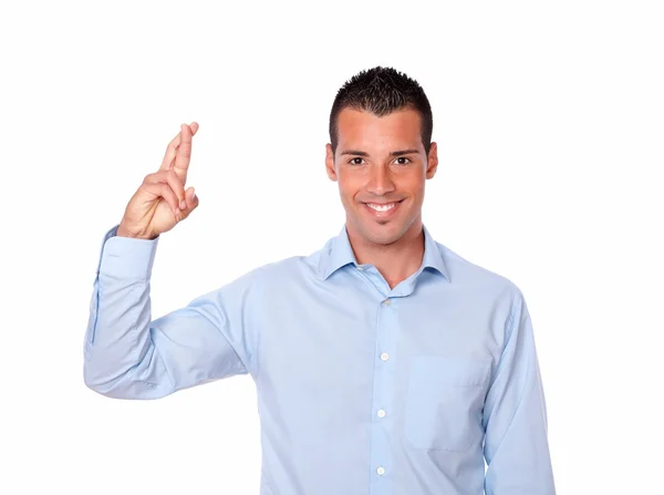 Attractive hispanic man with luck gesture — Stock Photo, Image