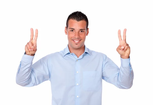 Gorgeous latin man with victory gesture — Stock Photo, Image