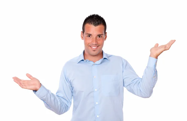 Gorgeous hispanic man holding out his palms — Stock Photo, Image