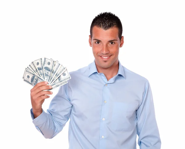 Handsome young guy holding his dollars — Stock Photo, Image