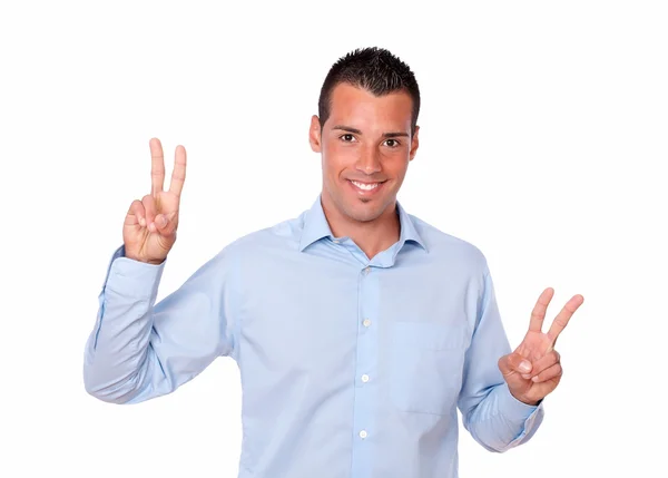 Attractive latin male with winning sign — Stock Photo, Image