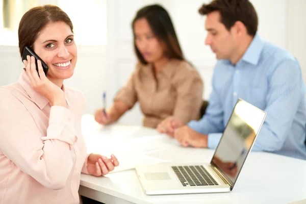 Lovely executive lady talking on her cellphone — Stock Photo, Image