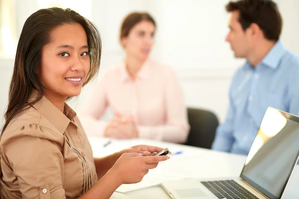 Attractive asiatic female smiling at you — Stock Photo, Image