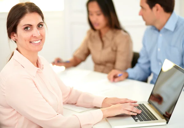 Professional executive woman smiling at you — Stock Photo, Image