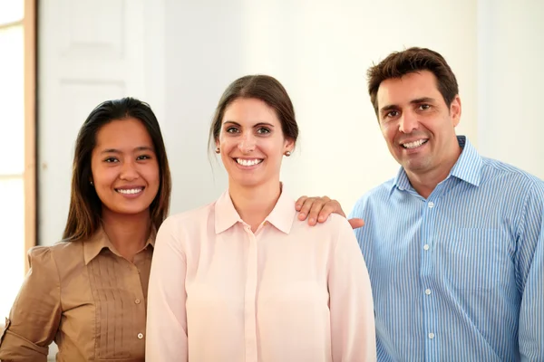 Professional business team smiling at you — Stock Photo, Image