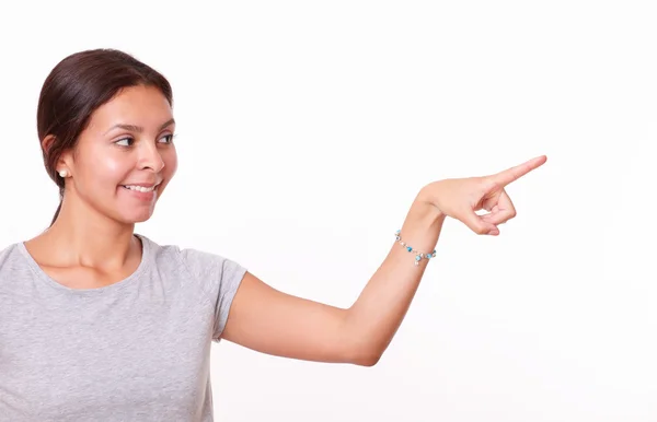 Menina apontando para a esquerda — Fotografia de Stock