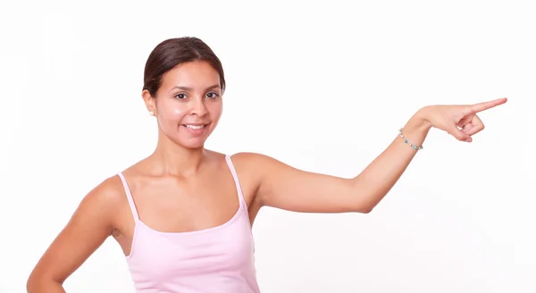 Brunette pointing at her left — Stock Photo, Image