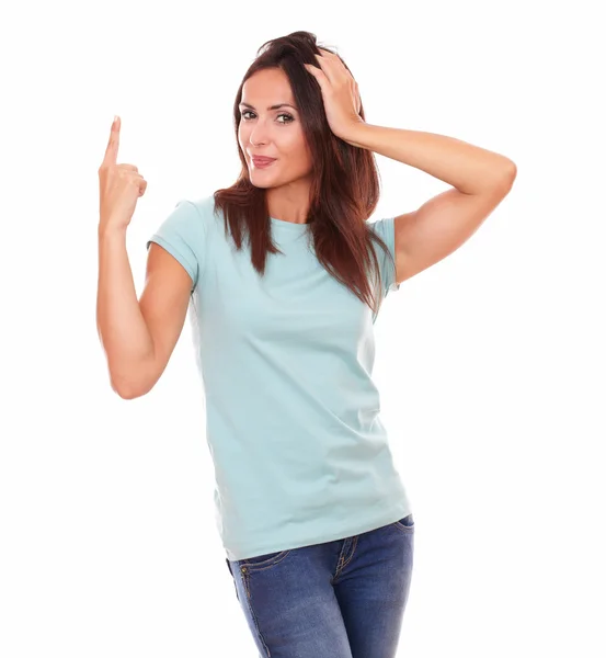 Crazy hispanic female pointing up her finger — Stock Photo, Image
