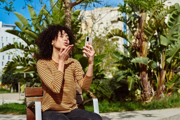 Attractive Young Black Woman Blowing Kiss Video Call Outdoors Day — Stock Photo, Image