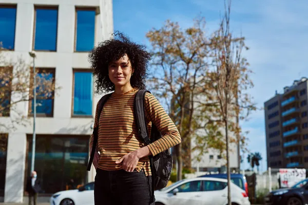 Cute Young Black Woman Backpack Looking Camera While Standing Alone — Stock Photo, Image