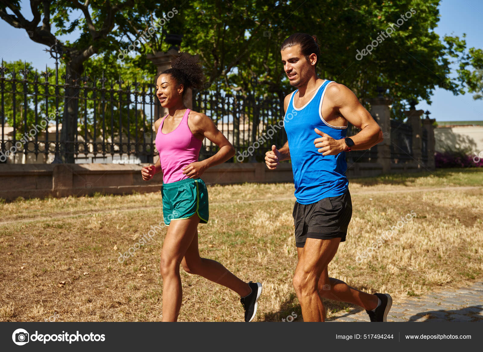 Sporty Young Couple Running Together Gym Clothing Outdoors Day Stock Photo  by ©pablocalvog 517494244