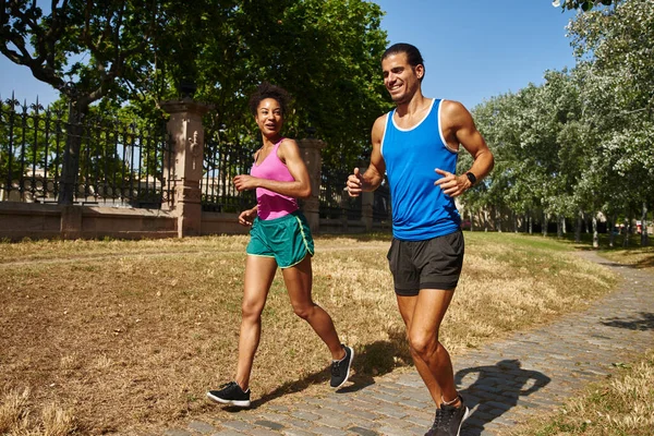 Happy Young Couple Jogging Together Gym Clothing Outdoors Day — Stock Photo, Image