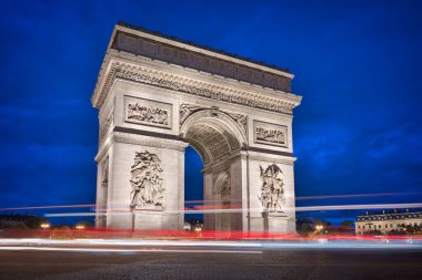Photo of the Arc de Triomphe in Paris at the blue our.