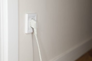 white plug in socket electric energy. High quality photo