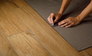 fabric marking hands ruler seamstress. High quality photo