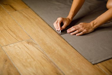 fabric marking hands ruler seamstress. High quality photo