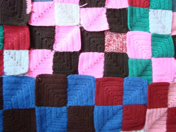 Crochet texture, colorful squares pattern. Crochet Knit Squares Multi Coloured