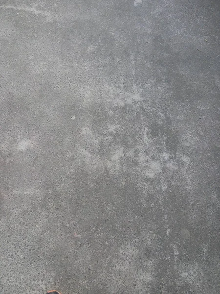 アスファルトの表面グランジラフ シームレスなTarmacダークグレーの粒状道路 テクスチャ背景 トップビュー — ストック写真