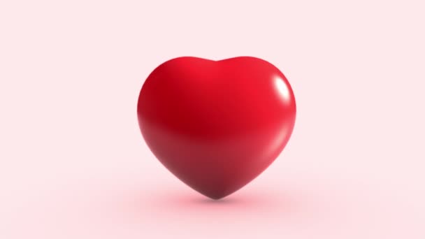 Pembe Arka Planda Kırmızı Kalp Atışı Tek Bir Nesne Sevgililer — Stok video